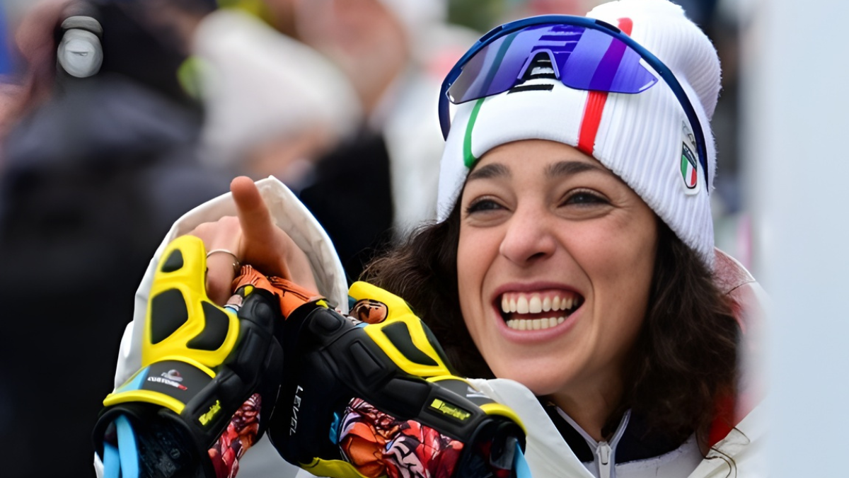 L’oro nero di Federica Brignone: in tribuna a Cortina spunta James, tra indizi social e un cappello tigrato che parla chiaro